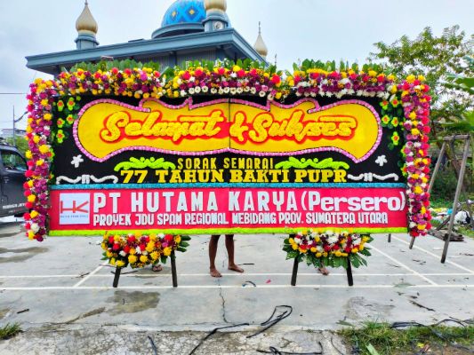 papan bunga model jakarta gandeng ucapan happy wedding